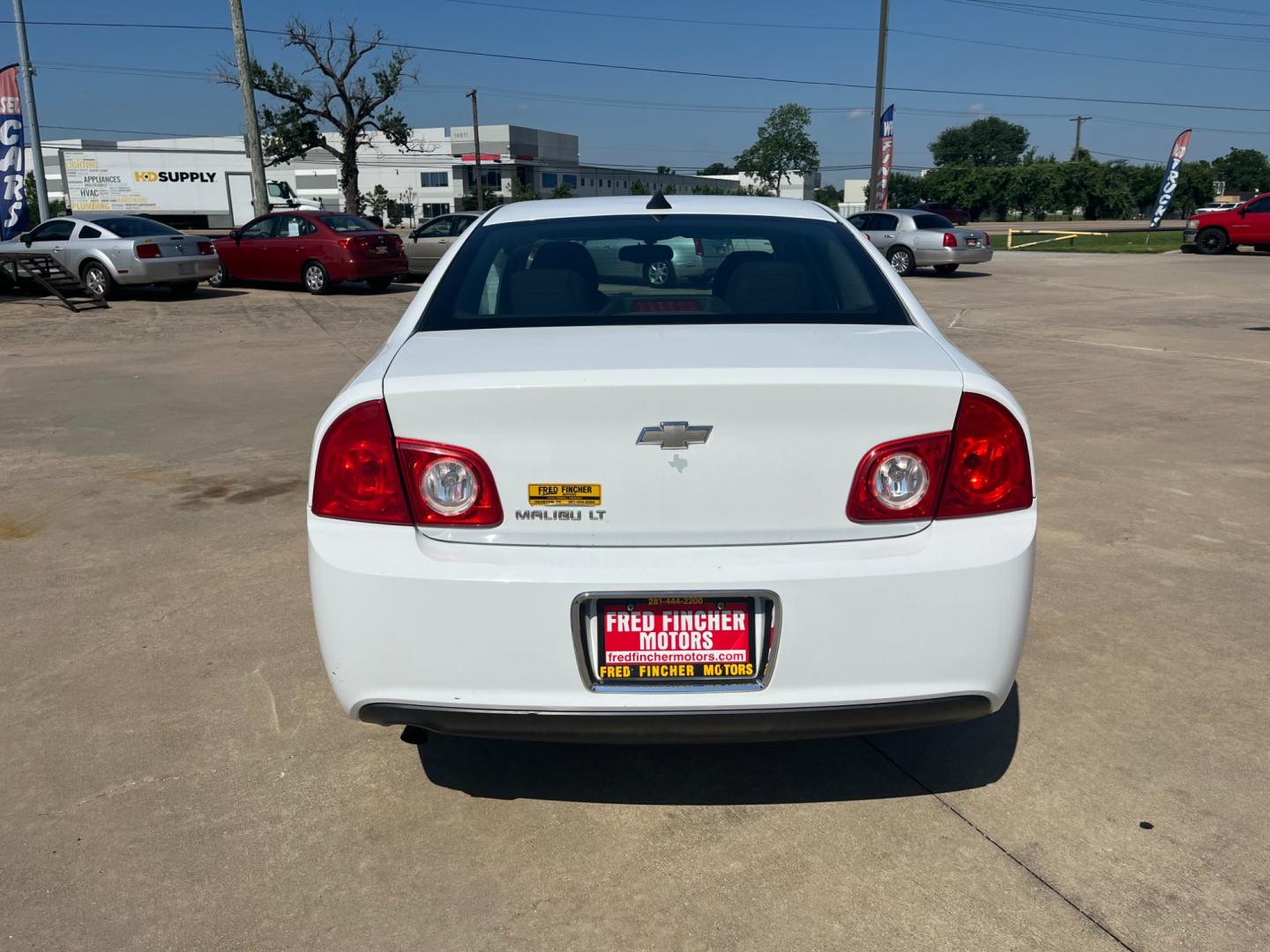 2012 white /black Chevrolet Malibu 1LT (1G1ZC5EU4CF) with an 2.4L L4 DOHC 16V FFV engine, 6-Speed Automatic transmission, located at 14700 Tomball Parkway 249, Houston, TX, 77086, (281) 444-2200, 29.928619, -95.504074 - Photo#5